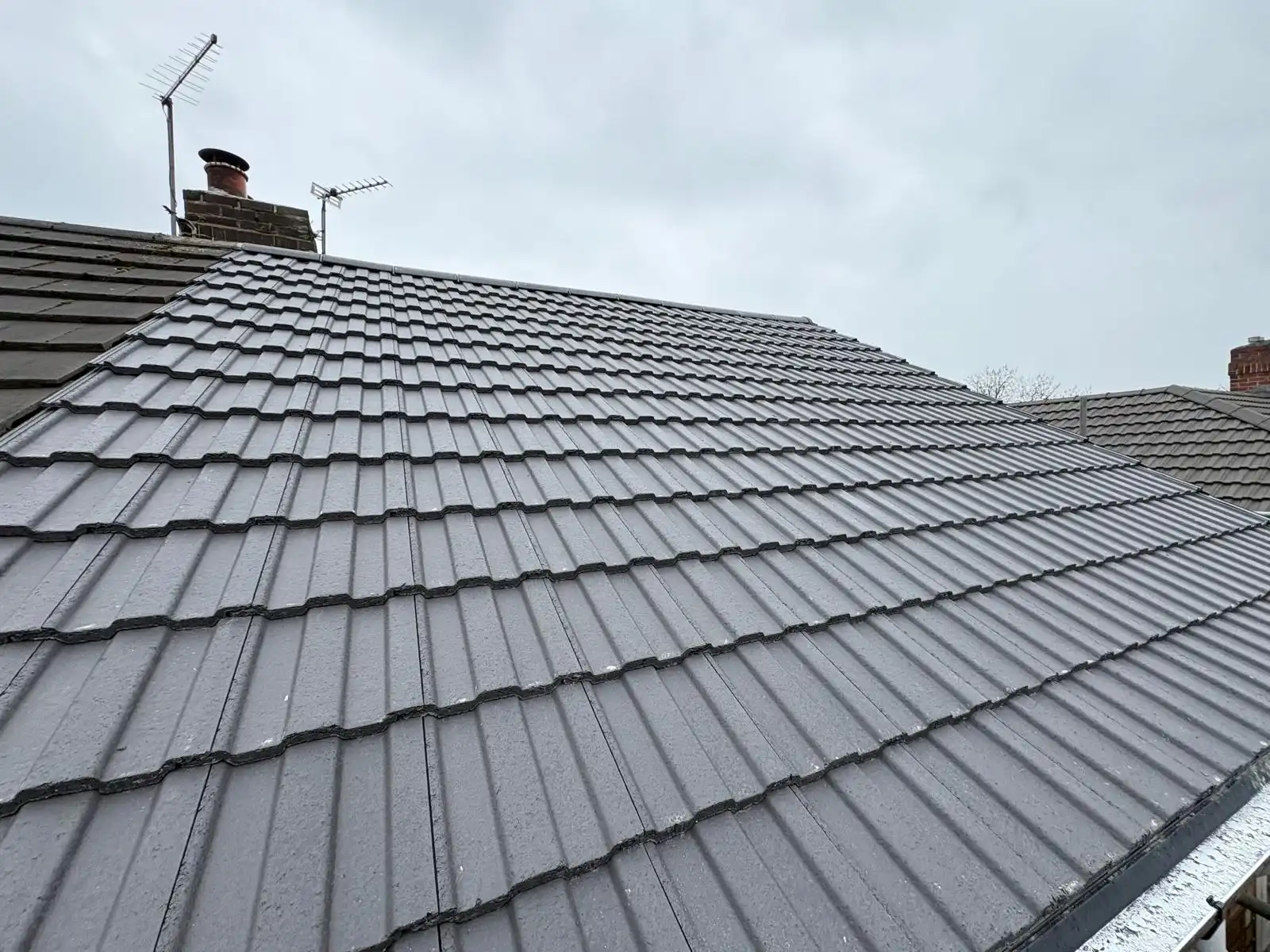 Grey tiled pitched roof